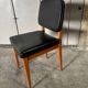 Set of 4 vintage 1960s chairs in wood and black faux leather – design