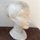 Platre jeune femme au chignon