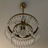 Cascade chandelier with crystal and brass tassels