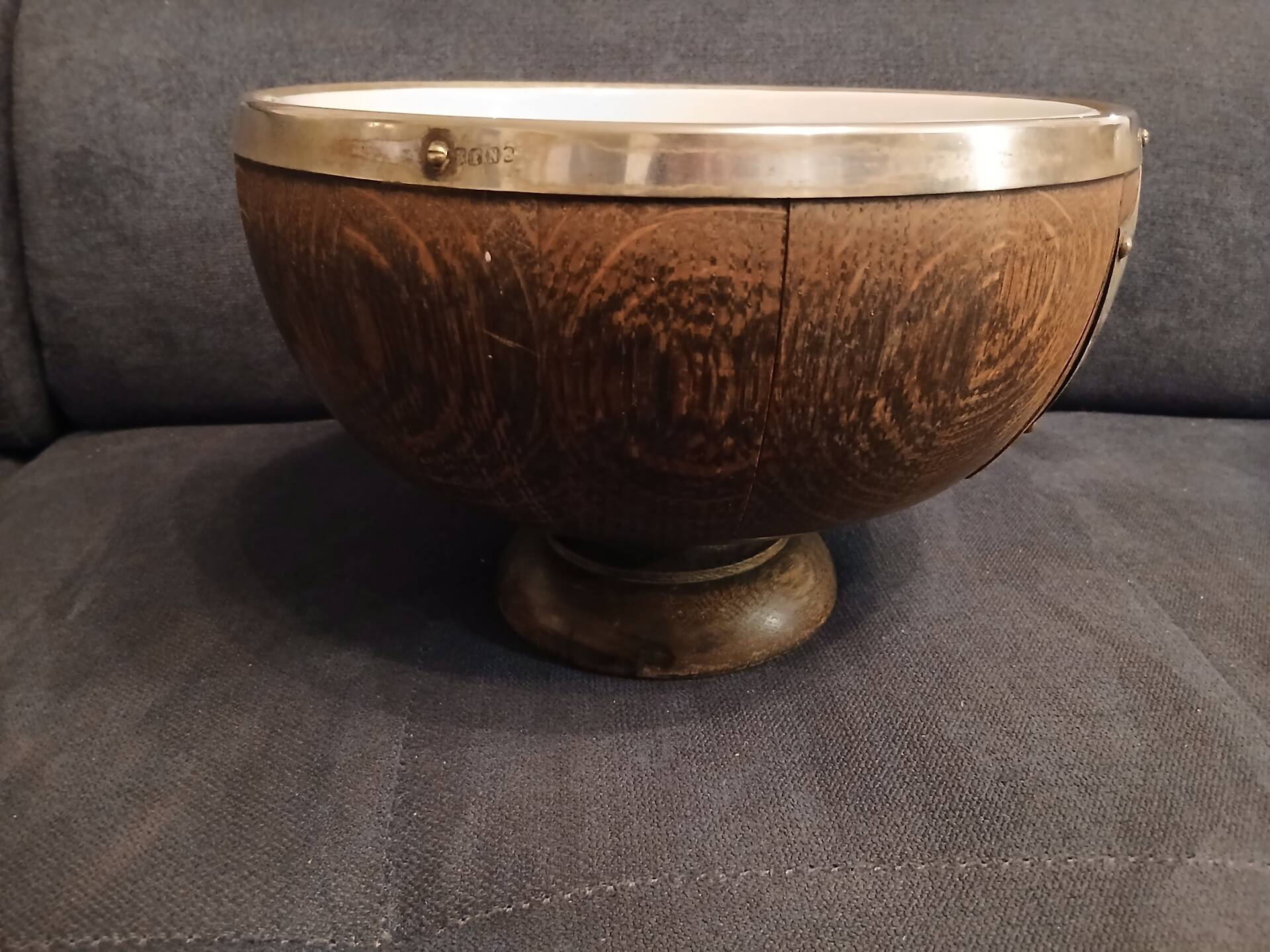 Victorian era silver-plated bowl with oak wood.