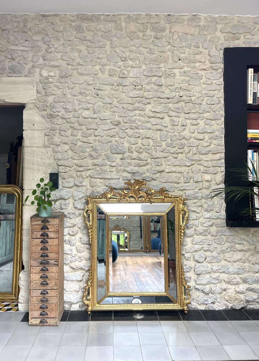 Antique mirror with a frame 123/100cm with gilded pediments, eagle heads, antique.