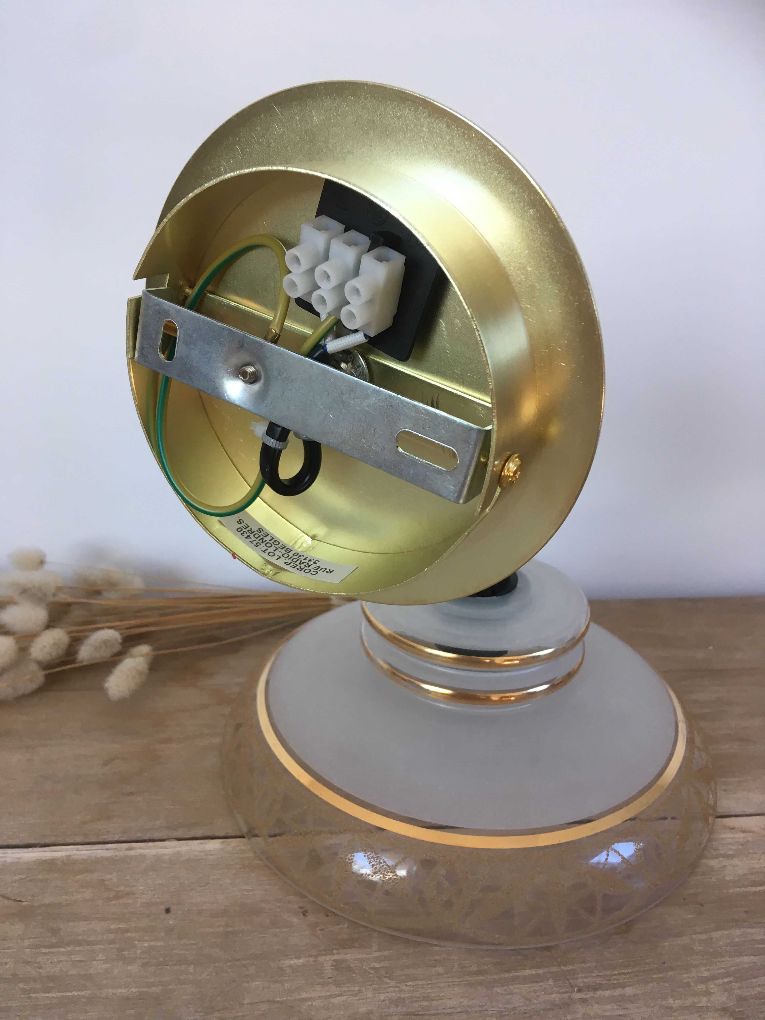 Vintage globe wall lamp in glass and brass base