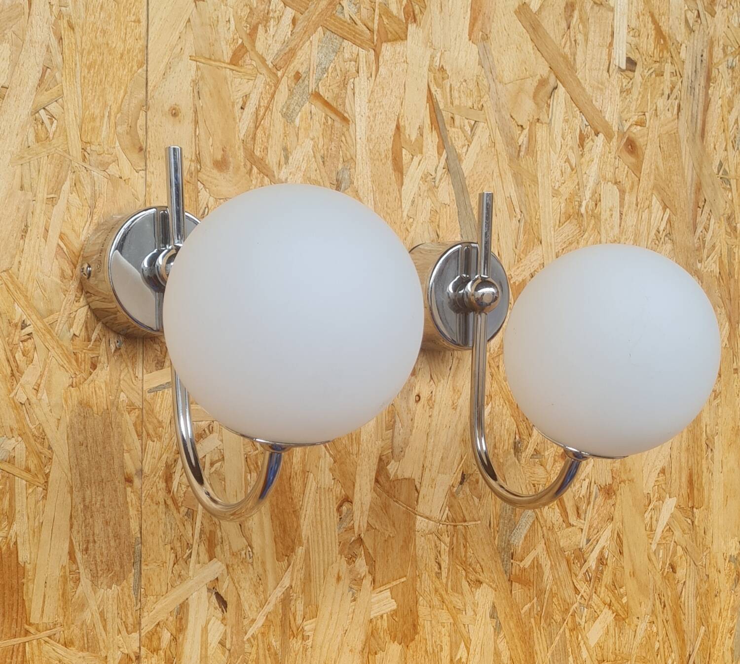Pair of ball and chrome wall lights