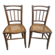 Pair of antique caned and wooden chairs from the 1900s.