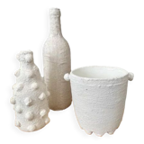 Trio of white vases
