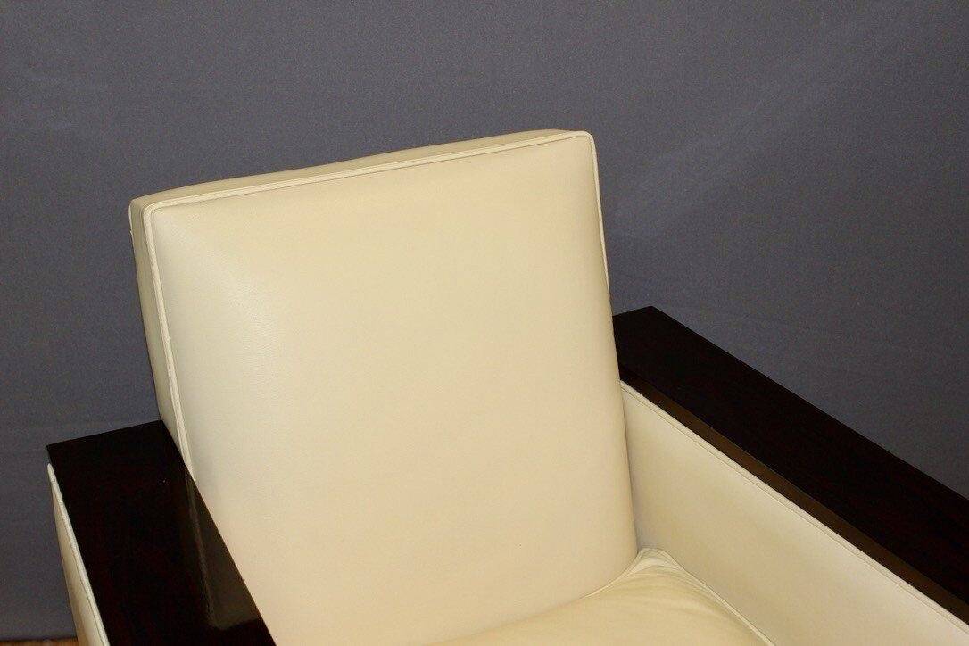 Pair of art deco armchairs in rosewood and beige leather