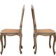 Paire de chaises d'appoint en canne de style Louis XV peintes en or et vert.