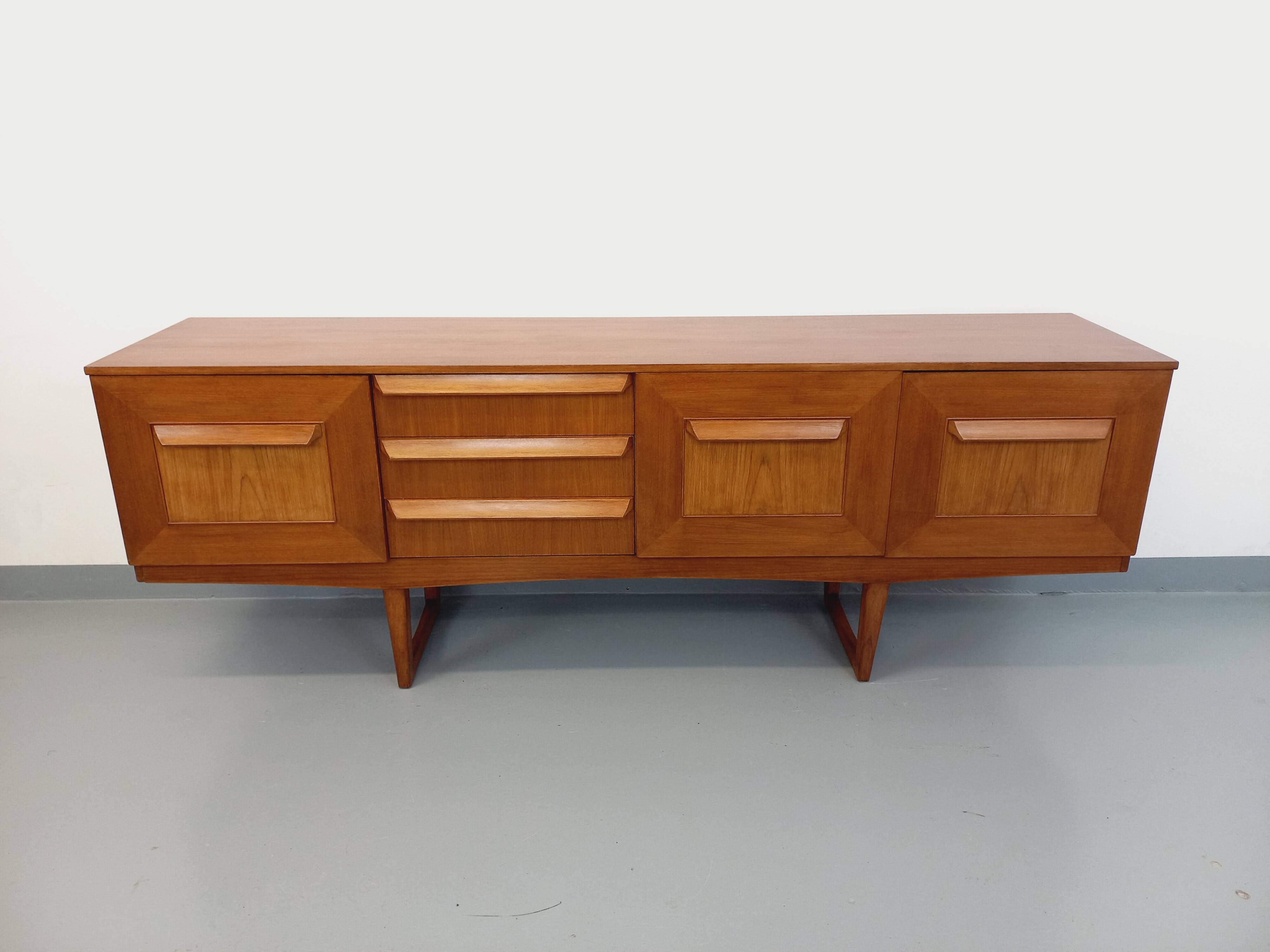 Vintage Scandinavian style sled foot sideboard in teak from the 60s