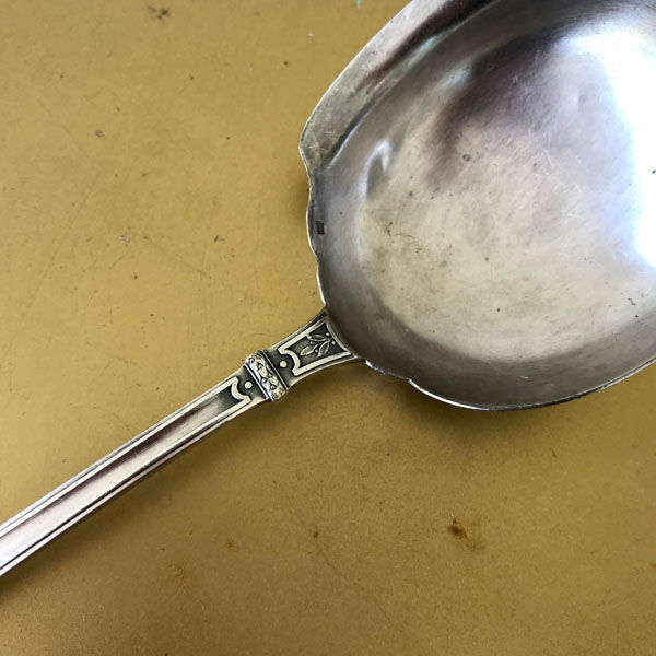 Silver metal ladle