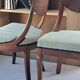 Pair of mahogany gondola chairs – Empire style – 20th century, restored