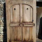Oak door with clover-shaped oculus