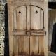 Oak door with clover-shaped oculus