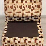 Vintage armchair from the 70s in beige and brown.