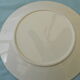 Flat plate in faience pink decoration