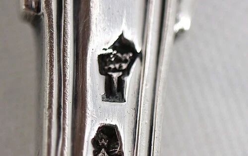 Serving spoon, silver, 18th century, straight thread pattern.