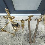 Brass fireplace set and its two andirons