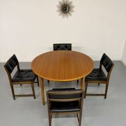 Vintage teak extendable round dining table Scandinavian design 1960s