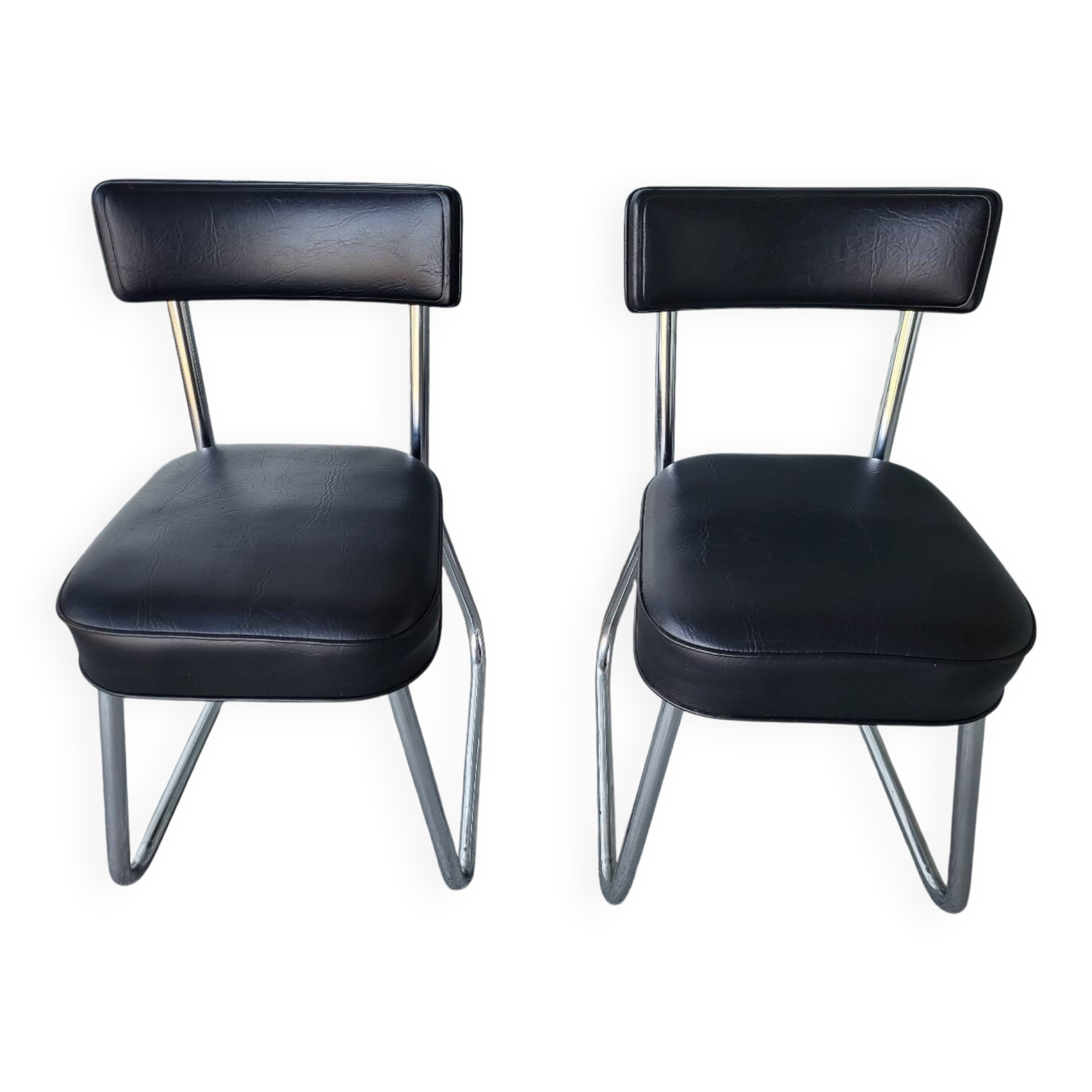 Pair of vintage black and chrome leatherette office chairs in very good condition