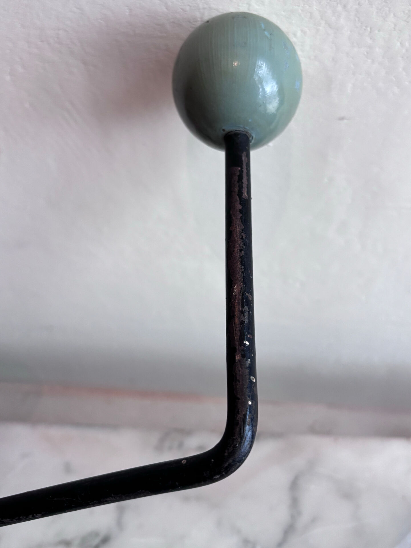 Wall coat rack Roger Feraud, metal and wooden balls.