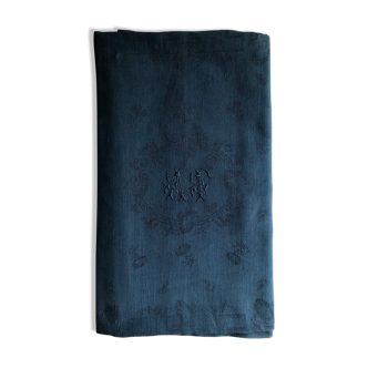 Old damask tablecloth in linen and cotton tinted night blue