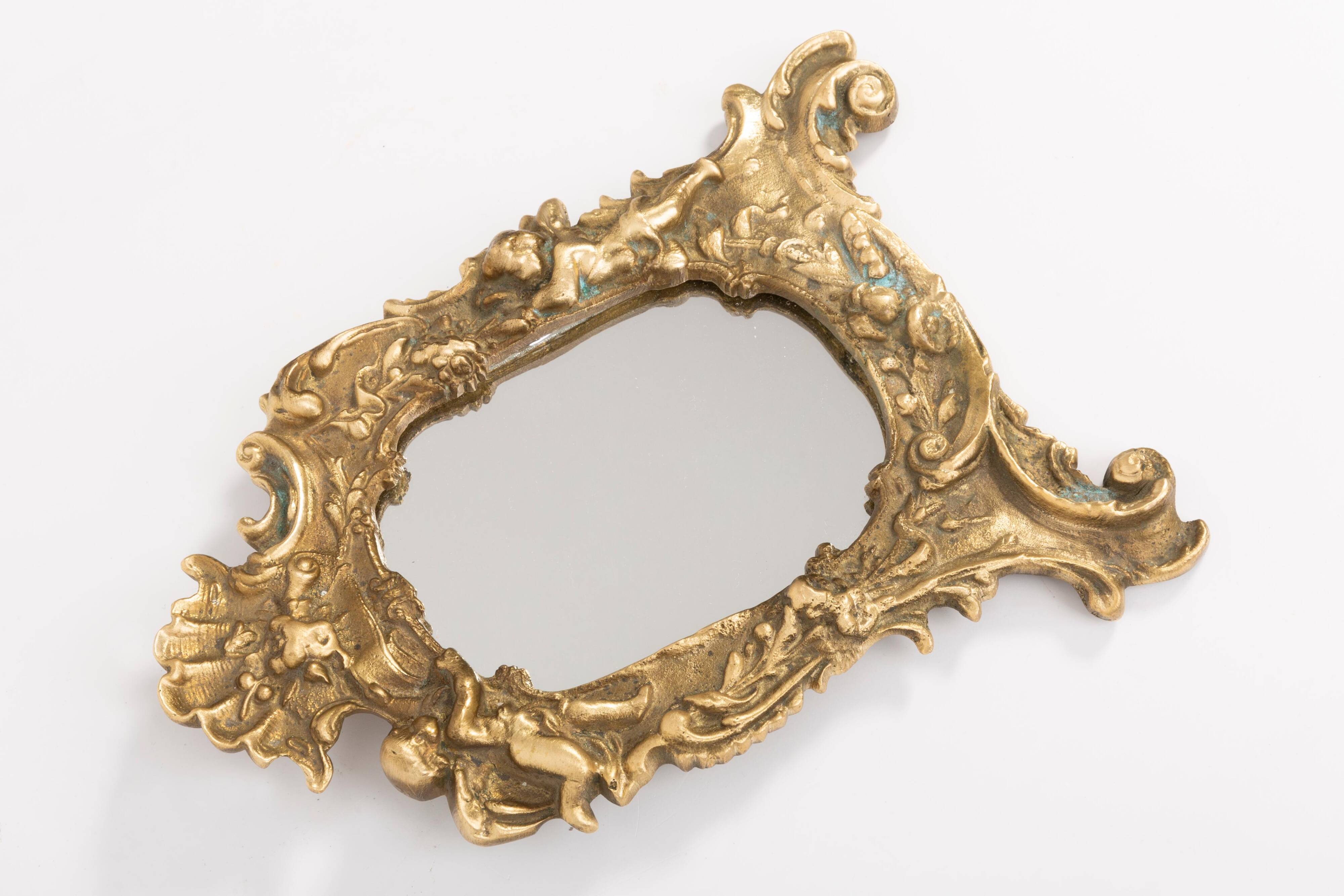 Miniature vintage gold mirror with angels, Italy, 1960s