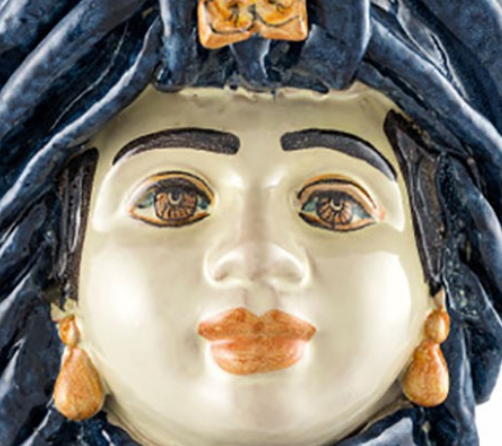 Woman's blue turban vase