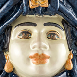 Woman's blue turban vase