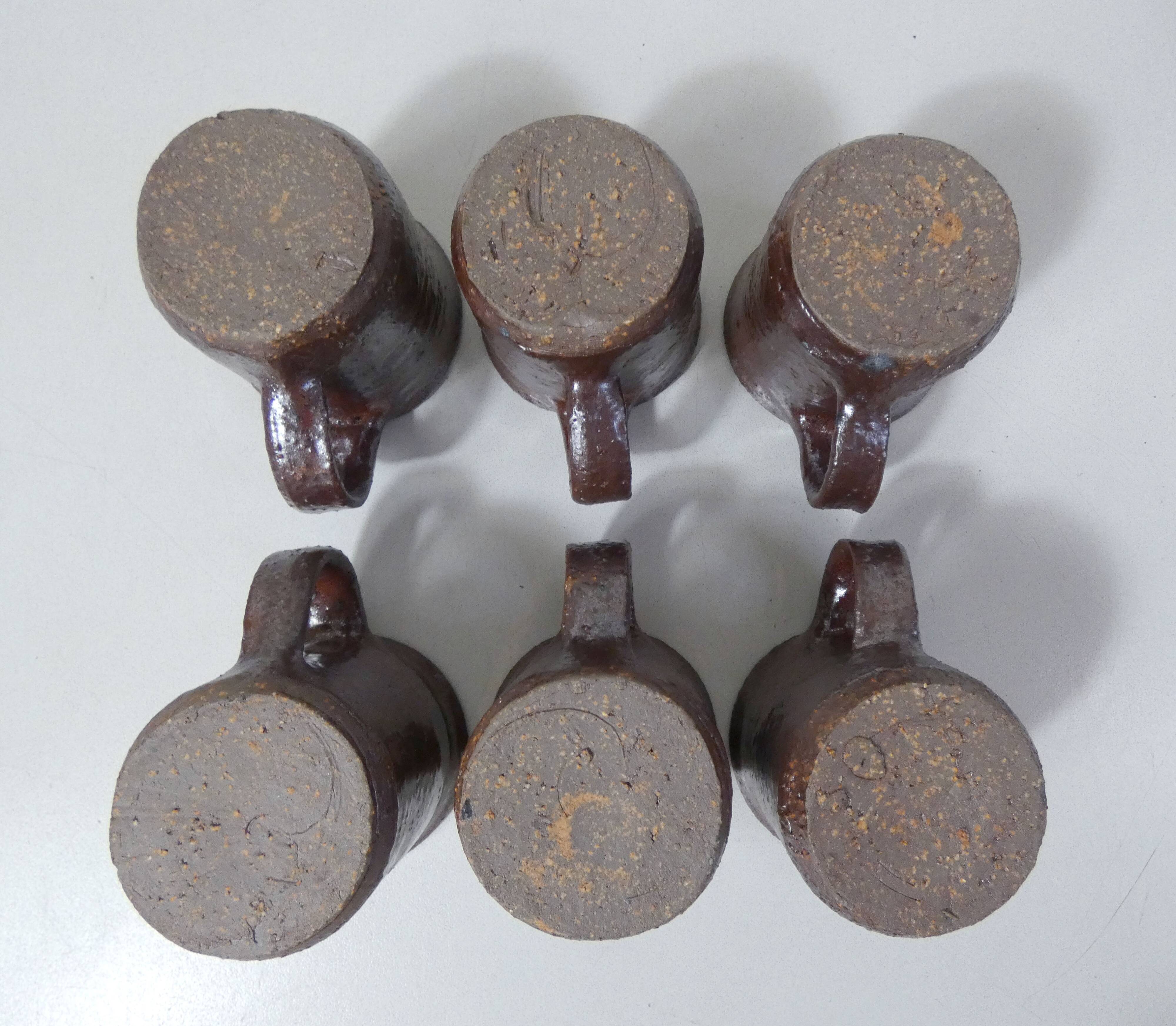 coffee service in iridescent stoneware cups and vintage sugar bowl