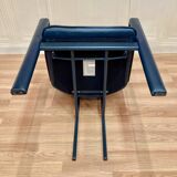 Set of 3 designer leather and metal armchairs.