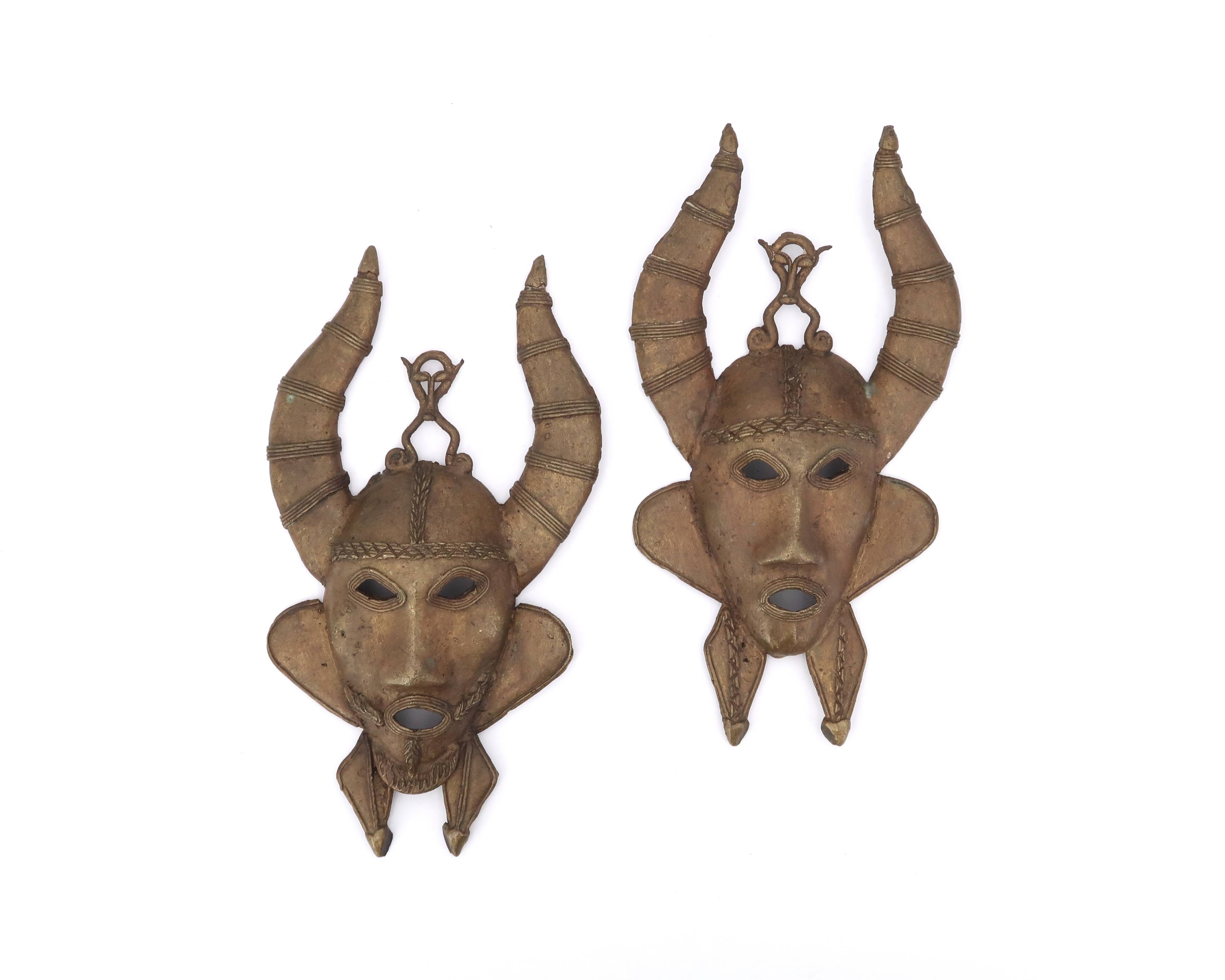 Pair of African brass masks, 1970s