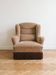 Vintage 1970s armchair in beige fabric with fringes.