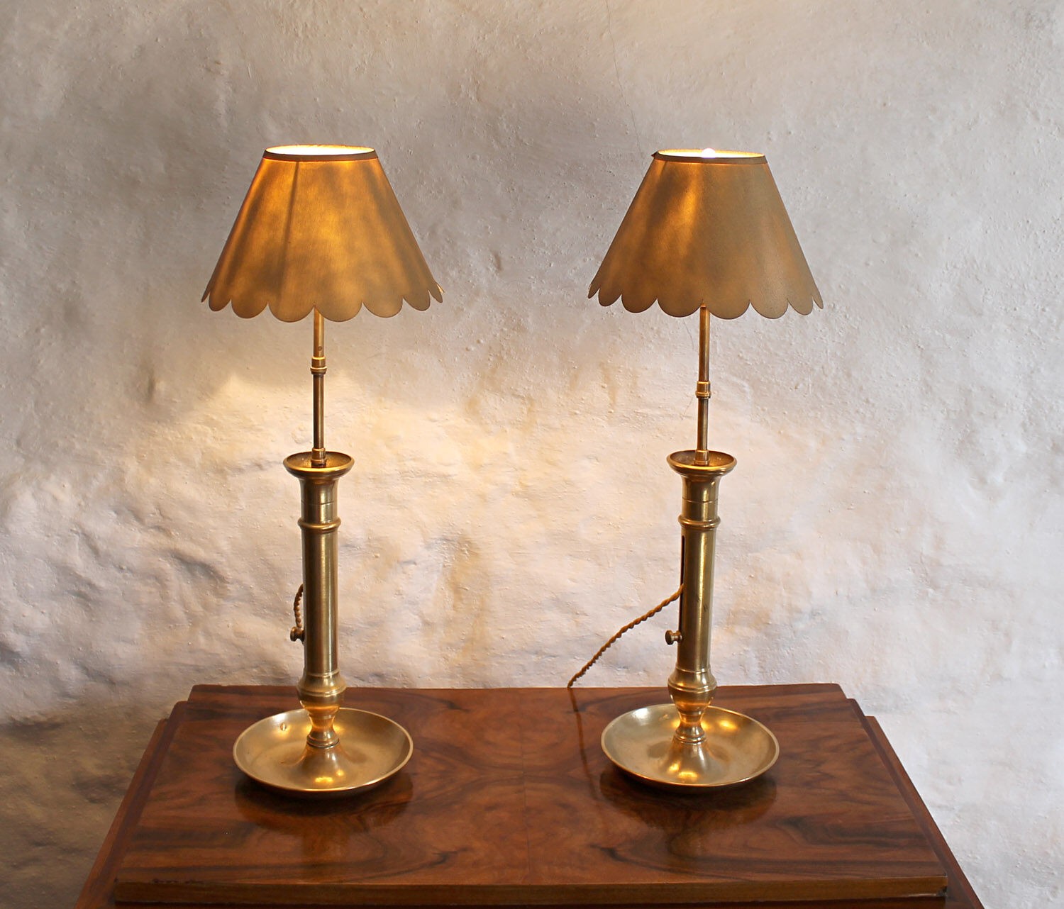 Pair of brass candlesticks lamps