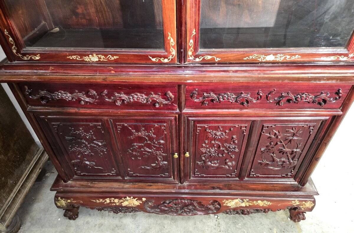 Asia 19th century: Ancient lacquer library, richly carved and decorated.