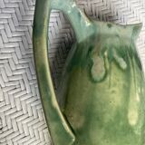 Turquoise green enamelled ceramic pitcher