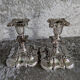 Pair of silver metal candle holders