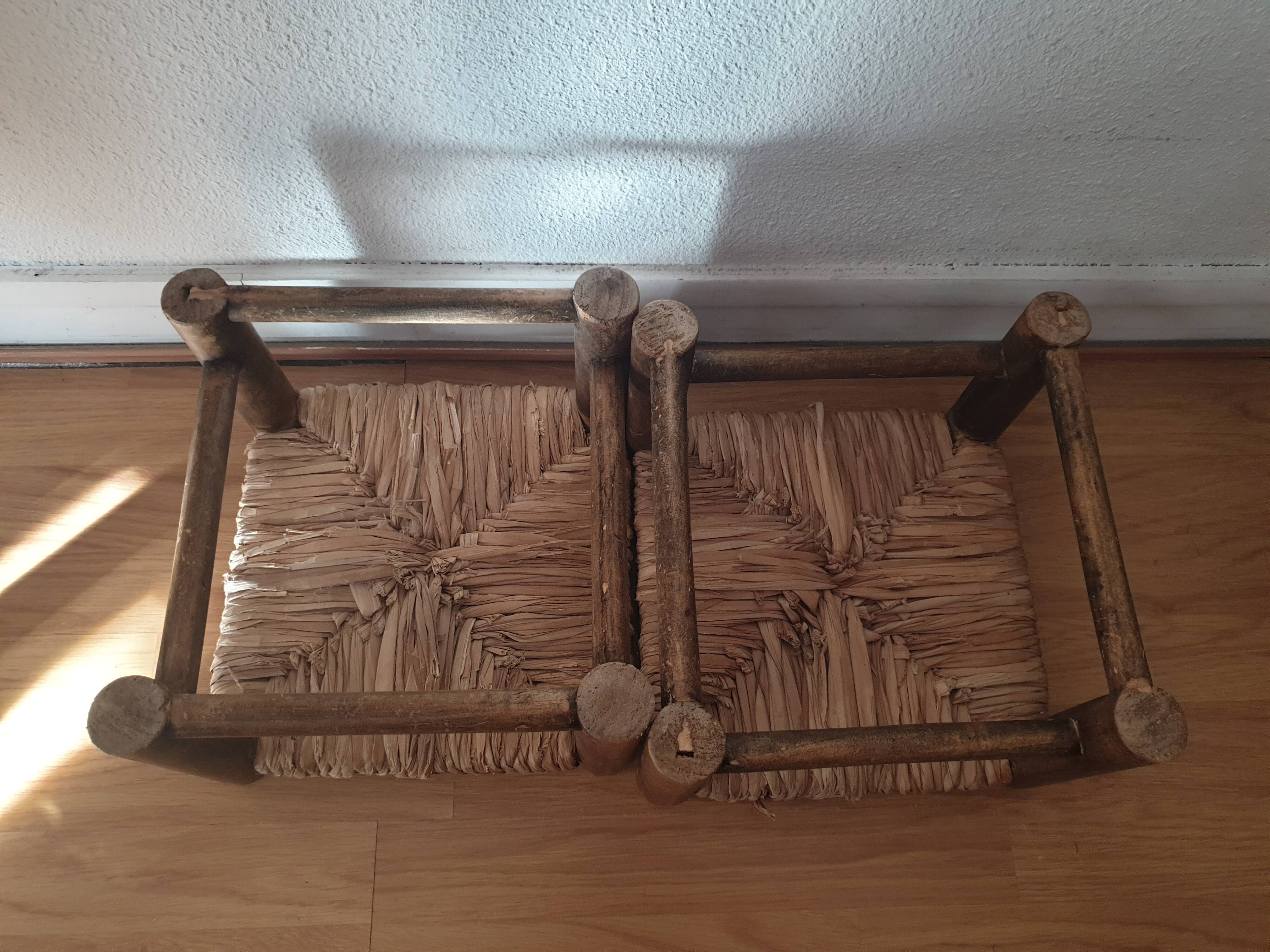 Pair of vintage straw woven foot stools