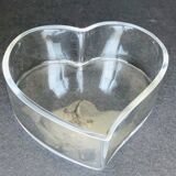 Empty glass heart-shaped pocket