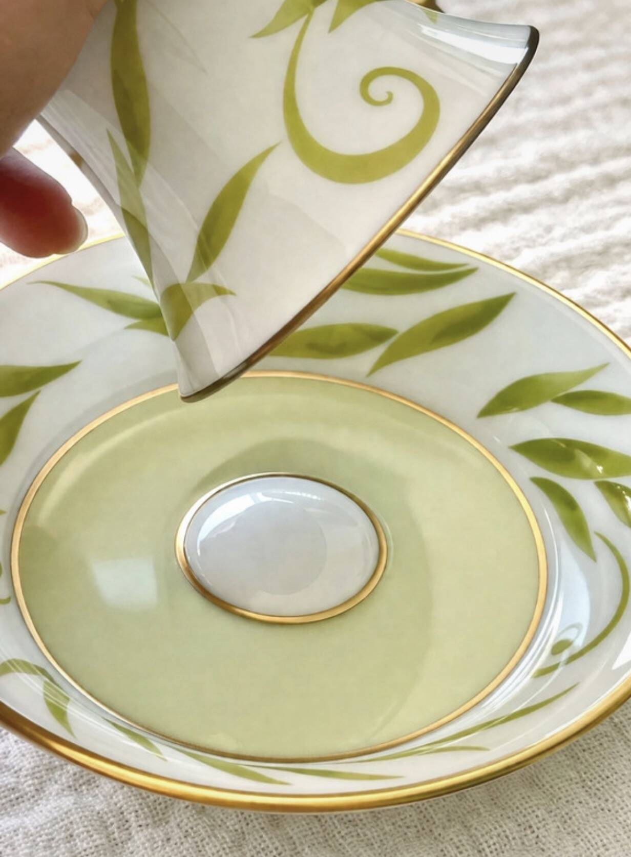 Bernardaud coffee/tea cup with saucer from the Frivole collection.