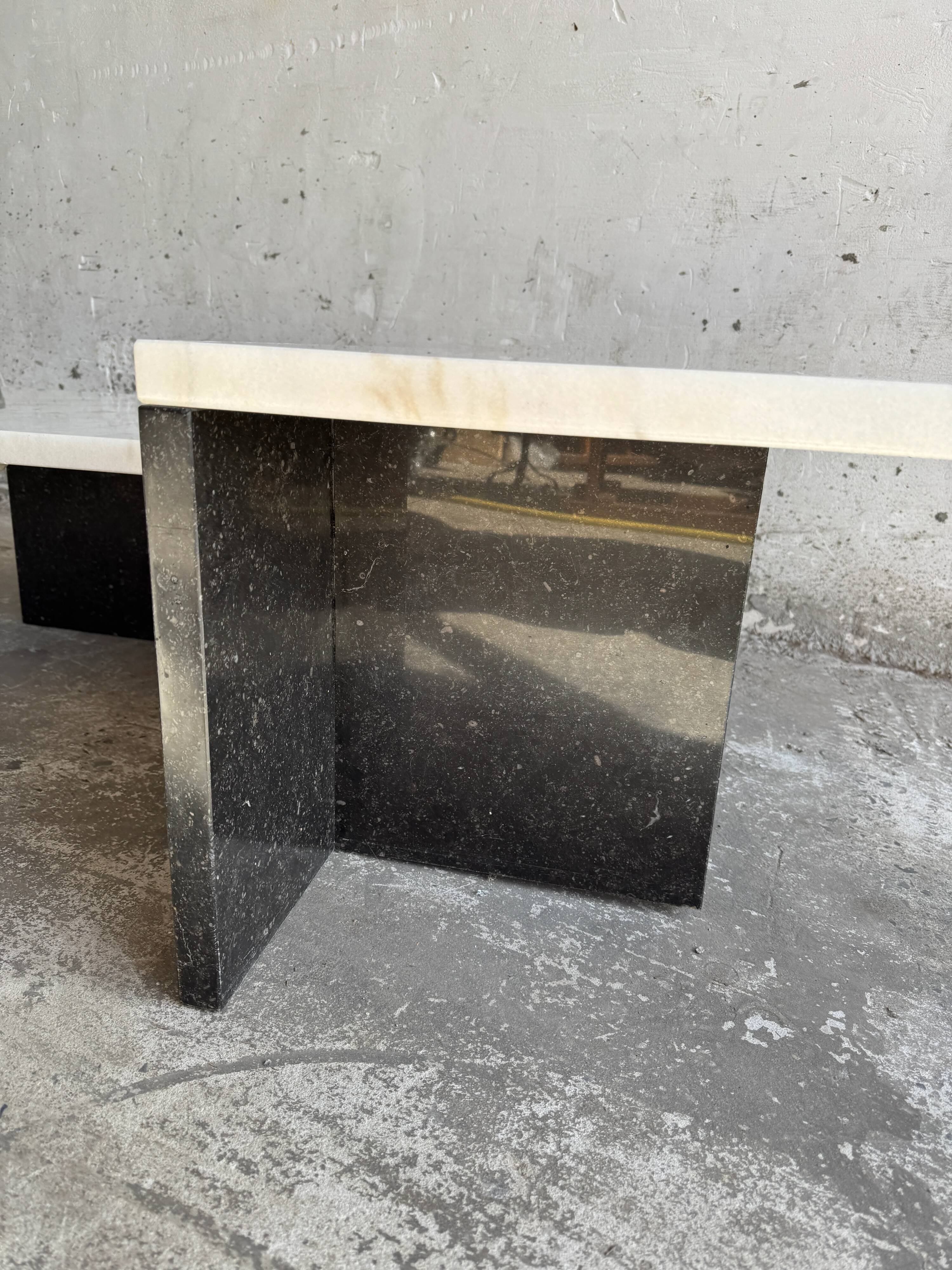 Postmodern white marble and black granite coffee table — sculptural asymmetrical design