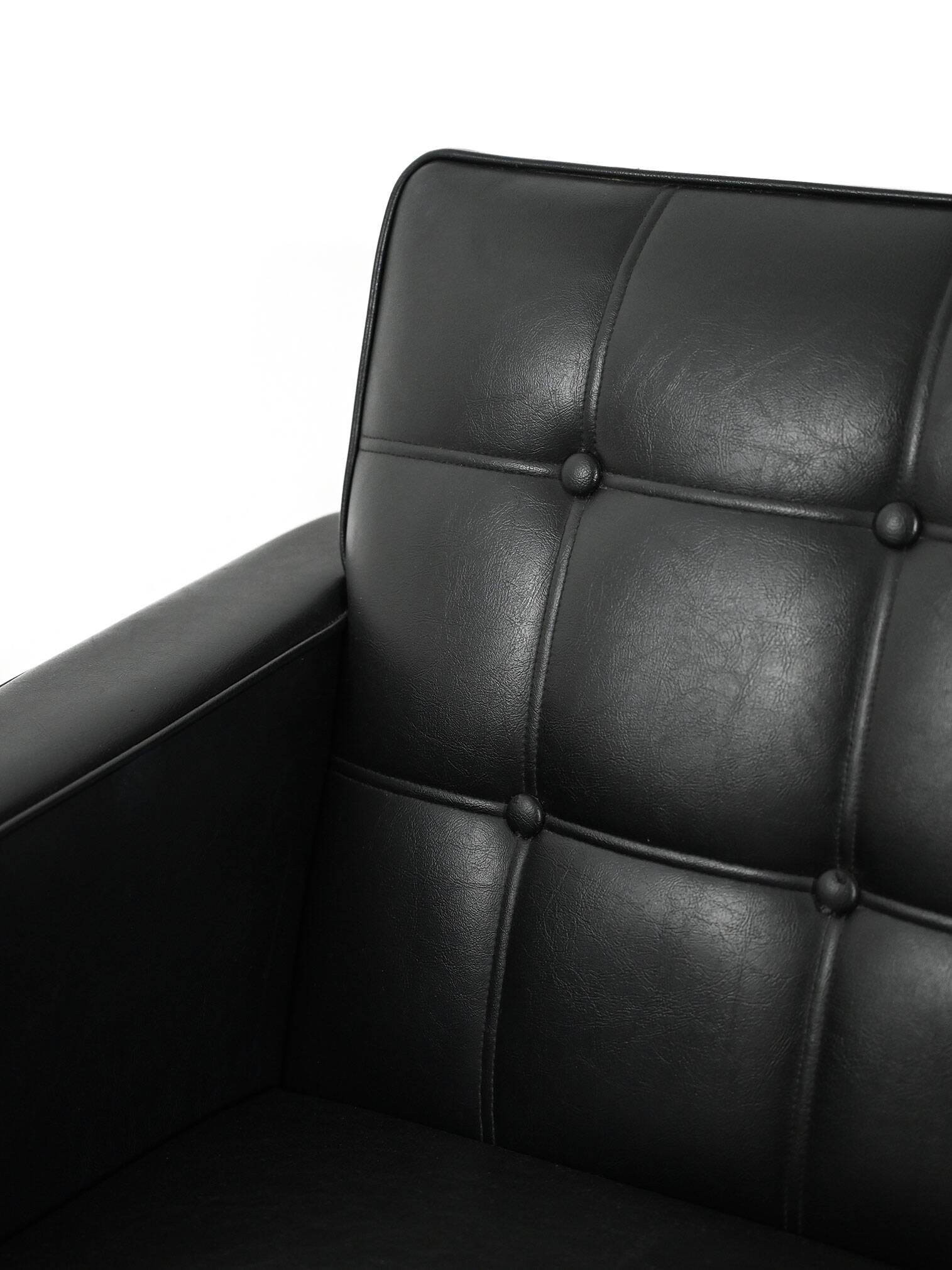 Swedish AB Futura teak and faux leather armchair