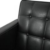 Swedish AB Futura teak and faux leather armchair