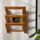 Wall-mounted magazine rack in varnished plywood, 80s/90s