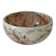 Red-orange glazed ceramic workshop bowl with floral decoration.