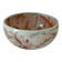 Red-orange glazed ceramic workshop bowl with floral decoration.