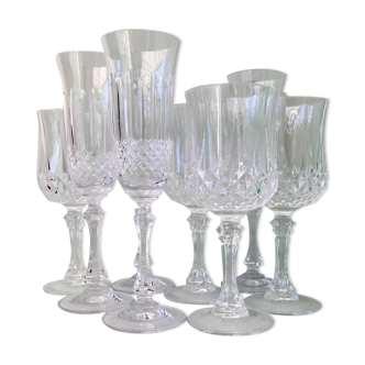 4 glasses and 4 crystal flutes wine and champagne