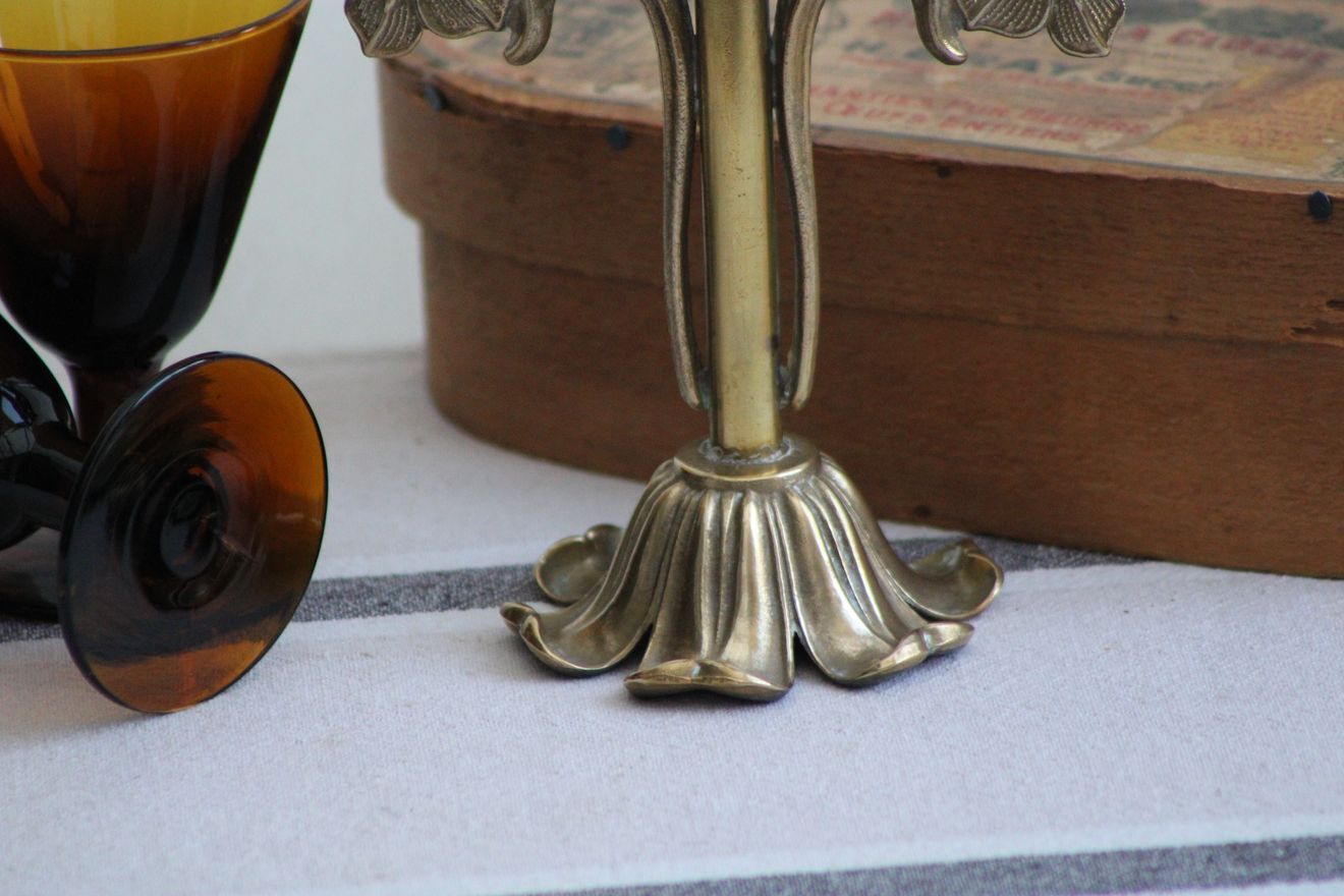 Golden metal stand candle holder