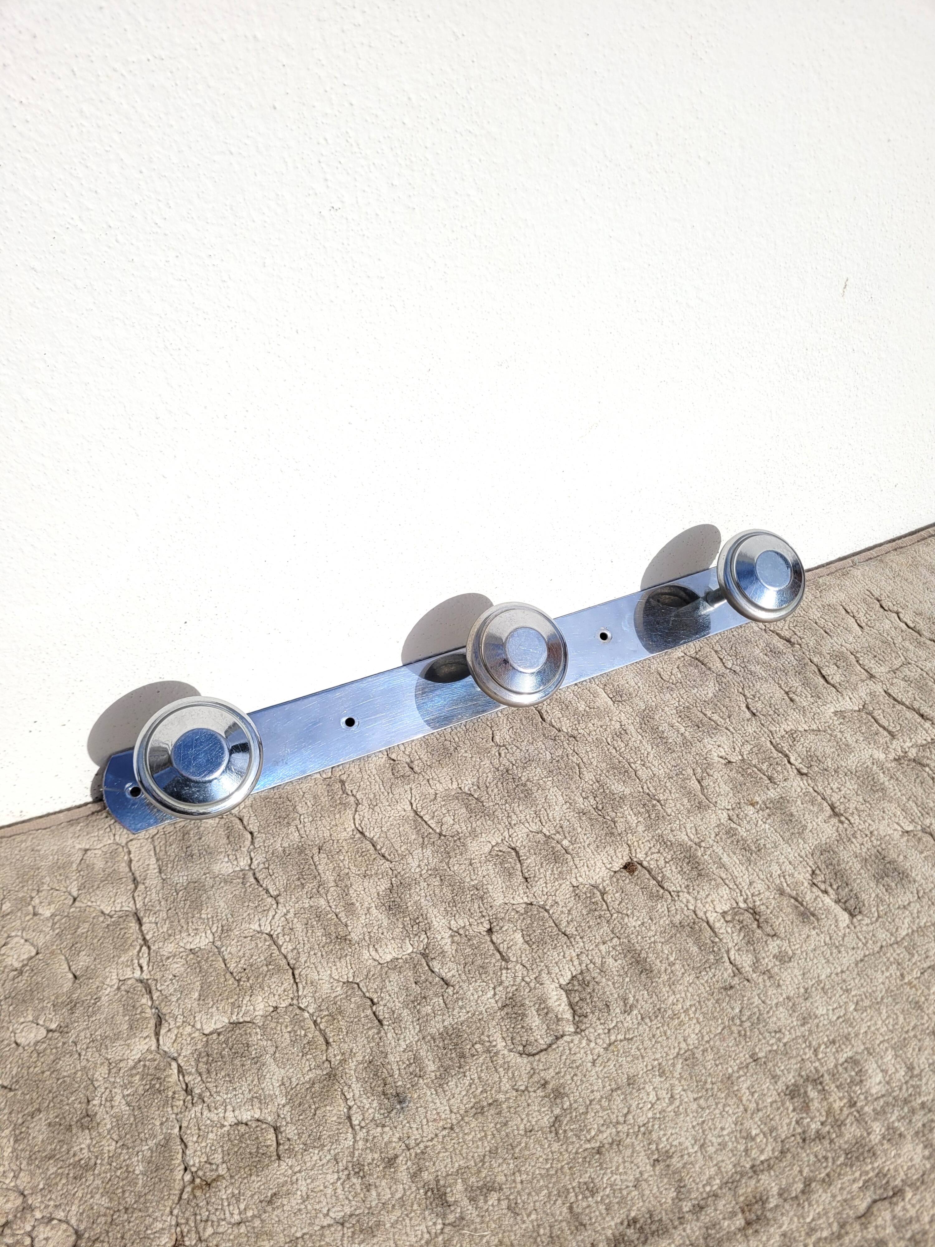 Wall-mounted coat rack circa 1950