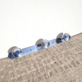 Wall-mounted coat rack circa 1950