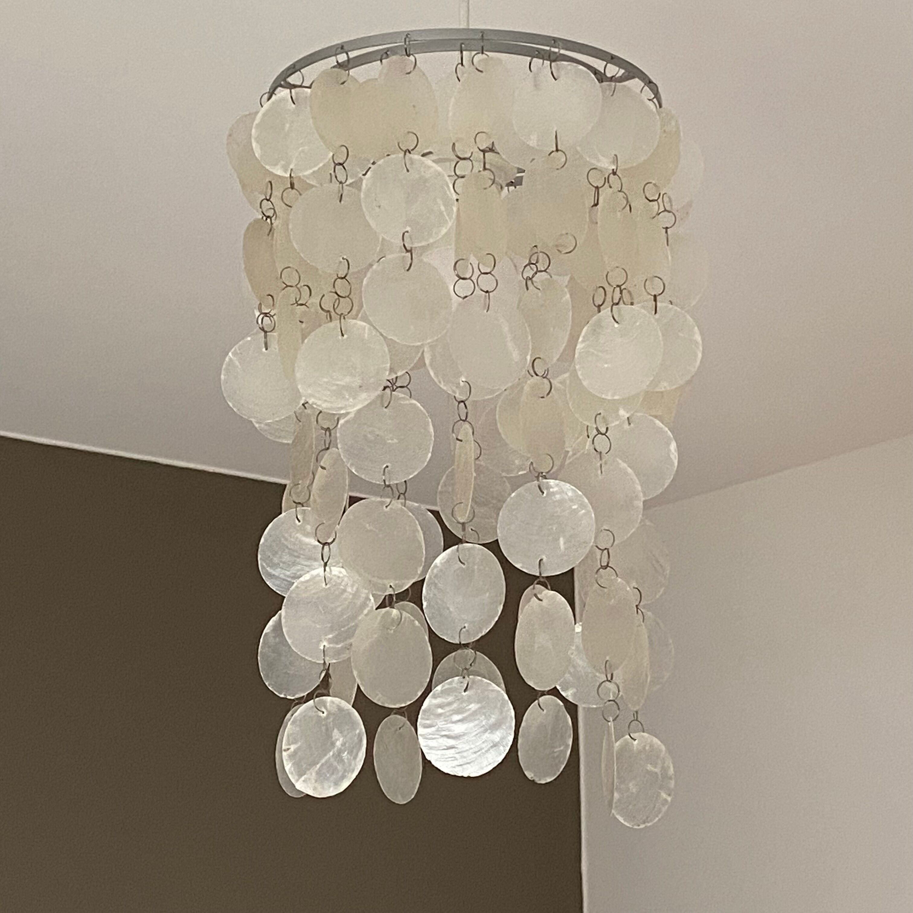 Suspension cascade with mother-of-pearl grapevines.