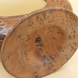 Antique mirror on wooden stand and metal net